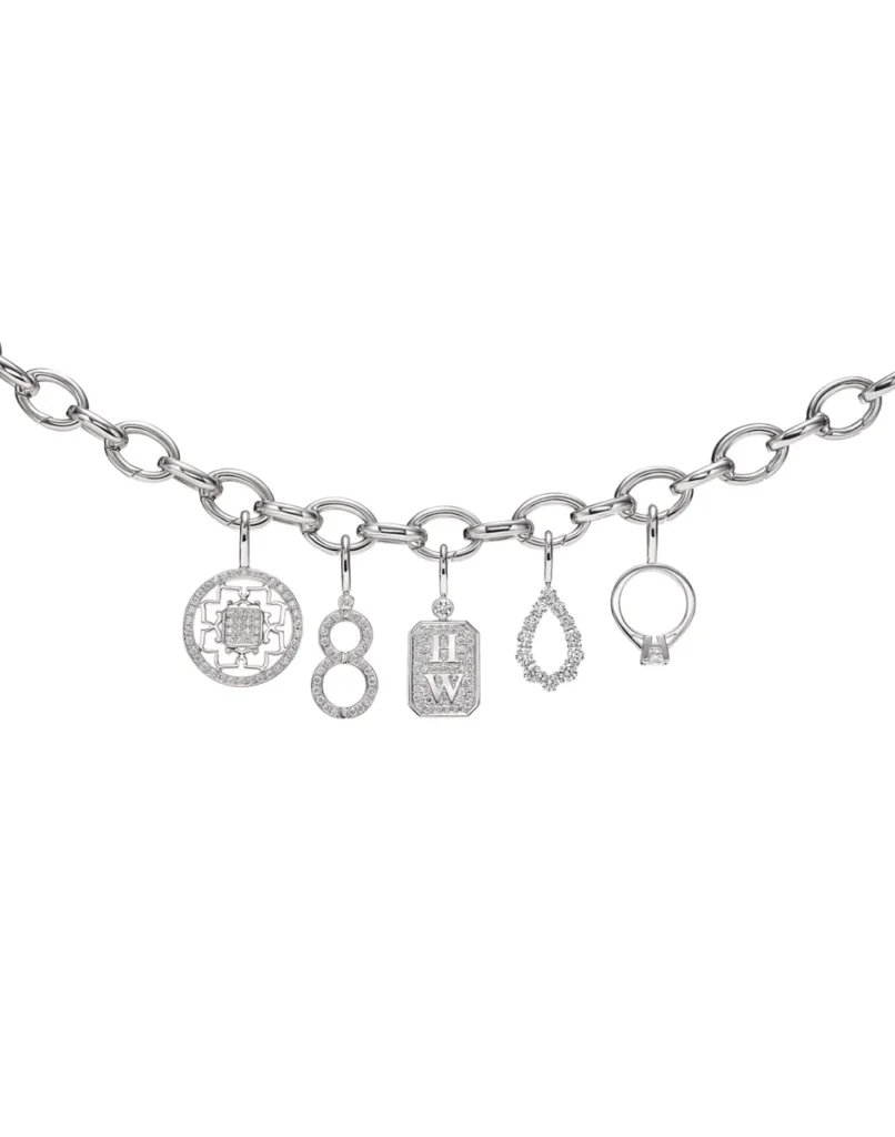 Harry Winston Charms collection: Fifth Avenue Baguette and Pave Logo & Lucky Eight diamond platinum bracelets