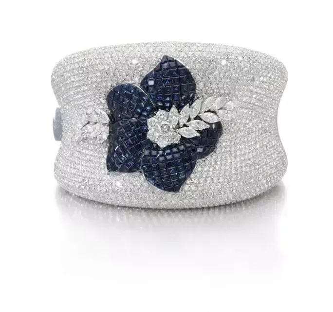 Platinum, sapphire, and diamond flower bracelet