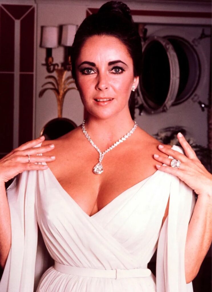 Elizabeth Taylor wearing a necklace made with the Taylor-Burton diamond