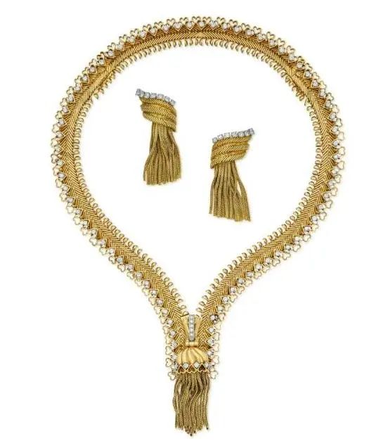 Van Cleef & Arpels
Zip Gold and Diamond Necklace and Earrings
From the Vault: Exceptional Signed Jewels
March 2024, Sotheby's New York
Estimate: $400,000 - $600,000
Sold for: $482,600