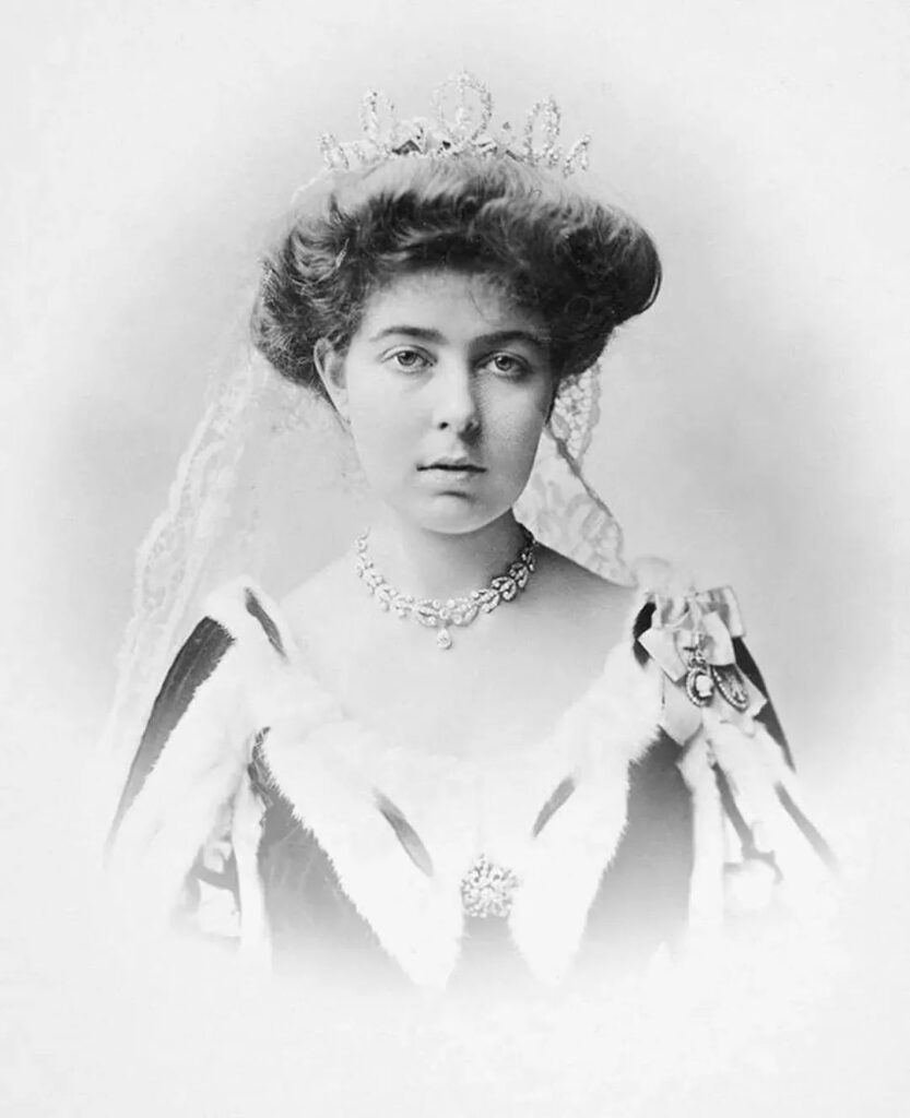 Princess Margaret of Connaught wearing the Connaught Diamond Tiara and the Boucheron Laurel Wreath Tiara as a necklace