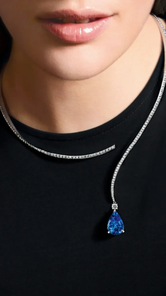 Eternity Question Mark Necklace: Crafted in white gold, set with a 12-carat pear-shaped Ceylon sapphire, pavé-set with diamonds; this necklace embodies Boucheron's concept of versatile jewelry, offering multiple ways to wear.