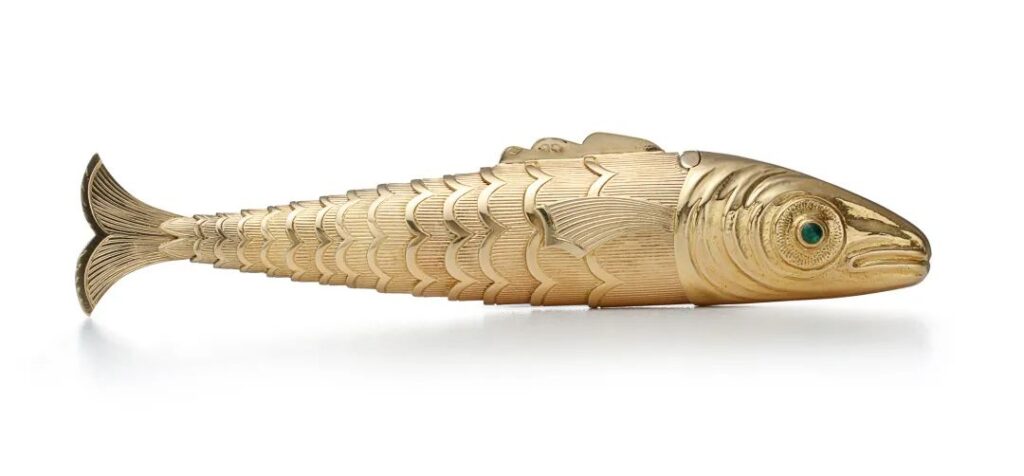 Gold cigarette lighter with emerald and sapphire fish design, designed by Jean Schlumberger between 1938 and 1939, from Tiffany's antique collection