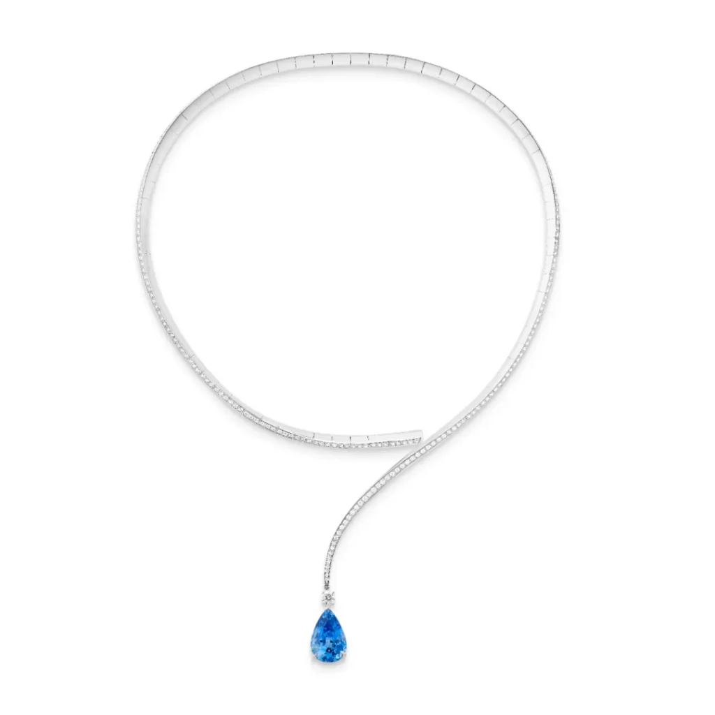 Eternity Question Mark Necklace: Crafted in white gold, set with a 12-carat pear-shaped Ceylon sapphire, pavé-set with diamonds; this necklace embodies Boucheron's concept of versatile jewelry, offering multiple ways to wear.