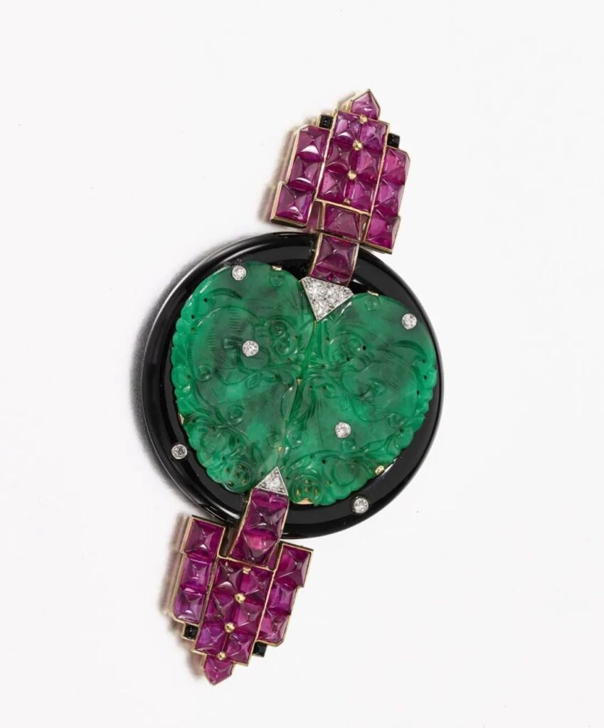 Mona Bismarck's Cartier brooch collection
Carved jadeite, rubies, diamonds
Circa 1925