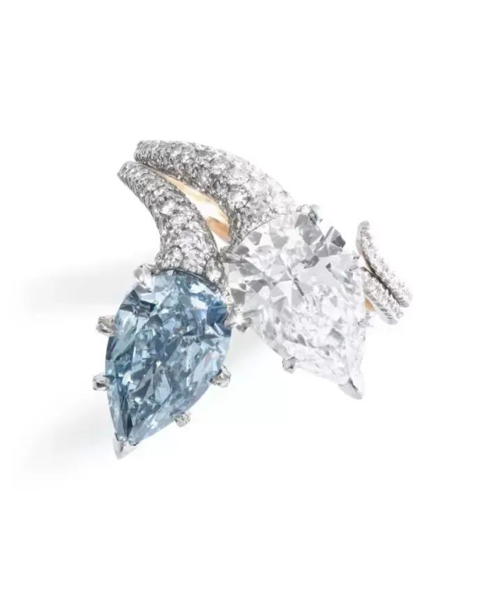 Toi et moi ring, 3.03-carat pear-shaped fancy blue diamond, 2.82-carat pear-shaped white diamond.