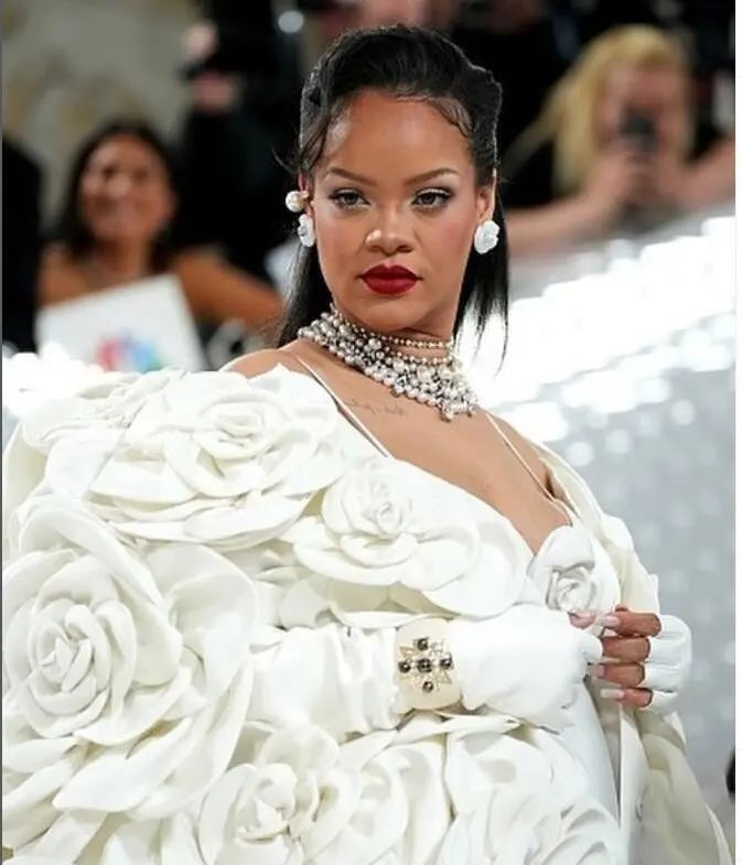 Rihanna wearing a Bulgari vintage pearl necklace
Verdura Maltese Cross cuff