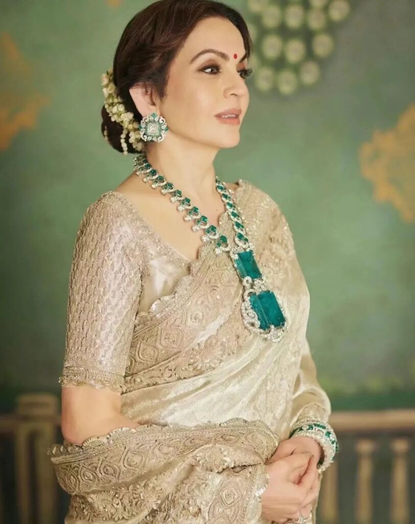 Nita Ambani wearing an emerald necklace