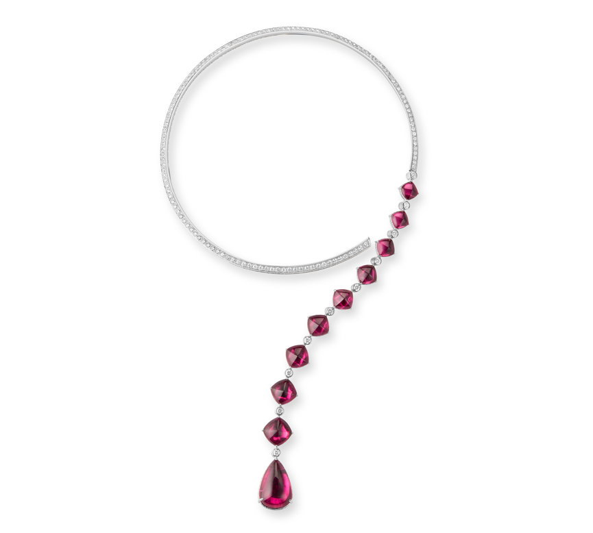 Goutte Question Mark Necklace
Made of white gold, set with 9 sugar-loaf cut red tourmalines and
1 pear-shaped red tourmaline (total weight 41.54 carats) and crystal, paved with diamonds
This necklace adheres to Boucheron's concept of versatile jewelry,
offering multiple ways of wearing