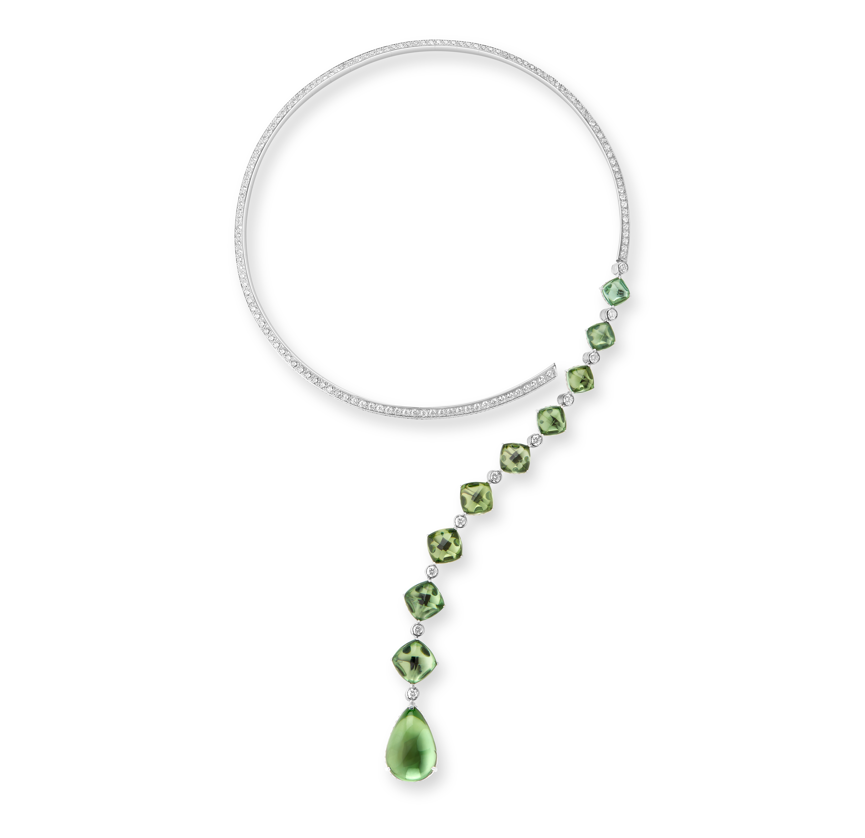 Goutte Question Mark Necklace,
Made of white gold, set with 9 sugar-loaf cut green tourmalines and
1 pear-shaped green tourmaline (total weight 44.81 carats) and
crystal, paved with diamonds