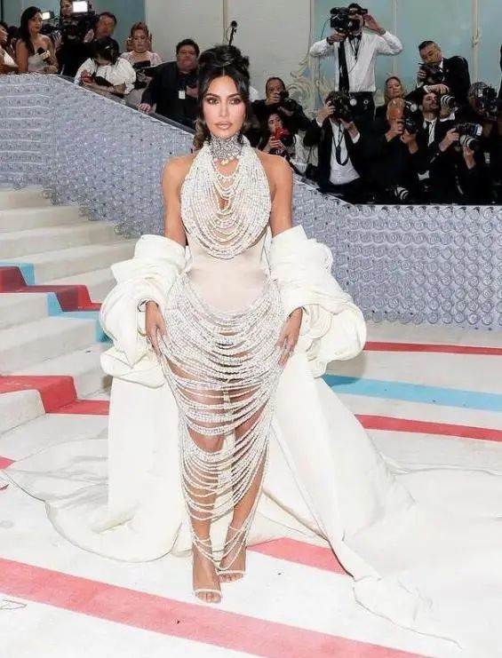 Kim Kardashian wearing a Schiaparelli pearl dress
Adorned with Lorraine Schwartz jewelry