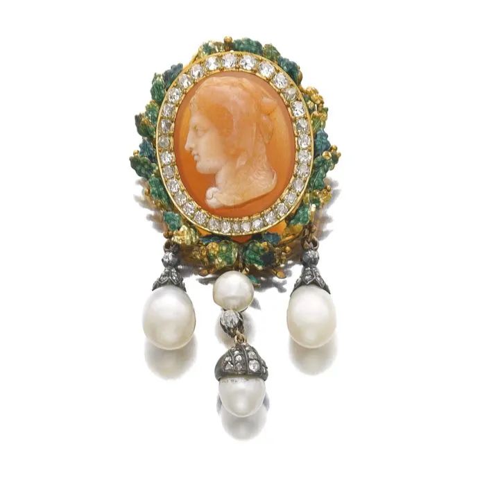 Sotheby's Geneva auction:
Carved agate, pearl, and diamond brooch, sold for 47,500 Swiss francs