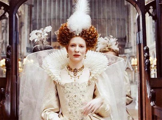 In the movie "Elizabeth," Cate Blanchett's portrayal of Elizabeth I perfectly recreates the Queen's image from paintings (the editor thinks Cate even looks a bit like the Queen!).