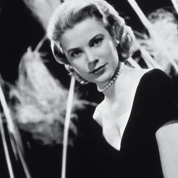 Grace Kelly wearing white South Sea pearl stud earrings, 1954