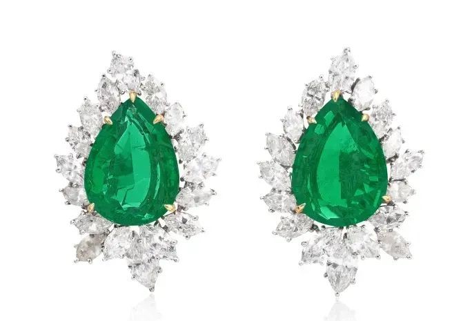 Jacques Timey, a pair of emerald and diamond ear clips. Estimate: 320,000 - 600,000 euros.