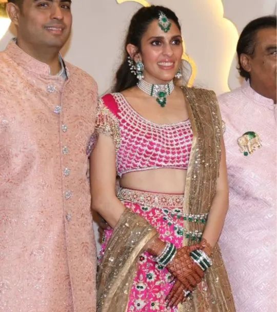 Shloka Ambani wearing emerald jewelry