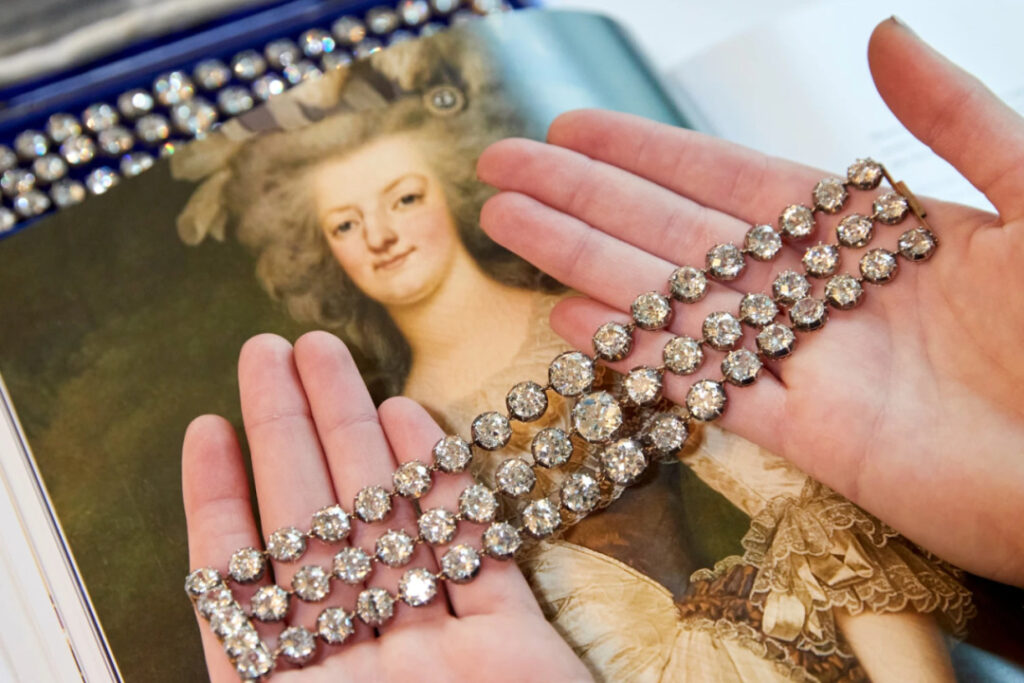 Queen Marie's pair of three-tiered diamond bracelets, set with 112 old-cut diamonds, weighing a total of 150 carats.
At a 2021 auction, this pair of bracelets sold for a staggering $8.2 million.