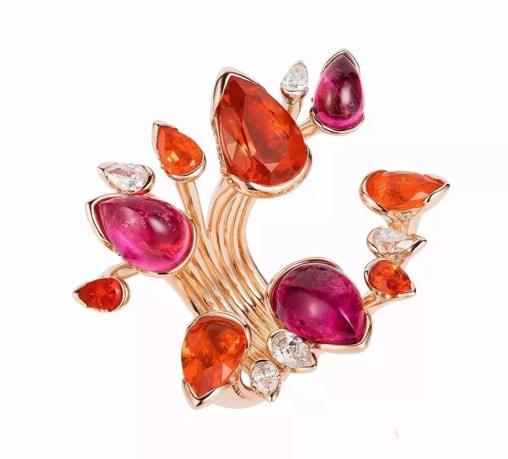 Fernando Floral design combining fiery red tourmaline and fire opal