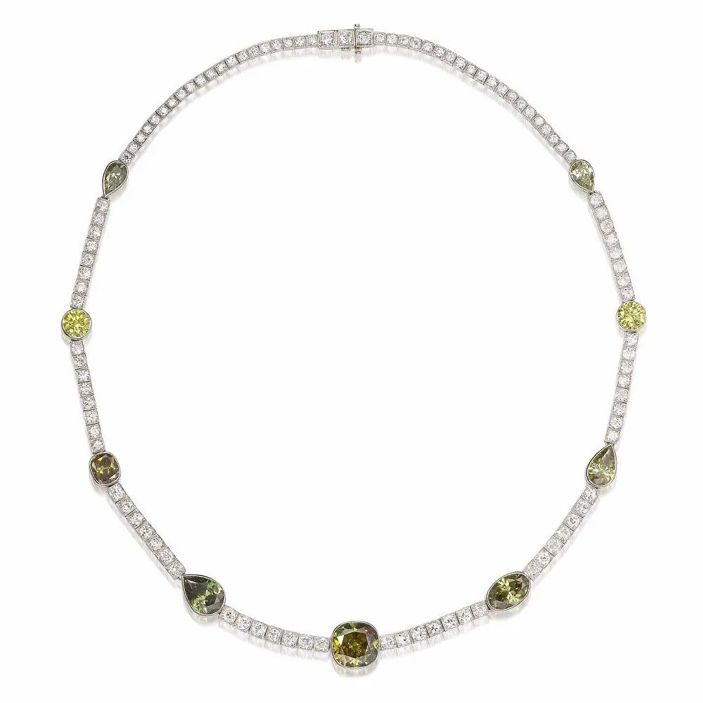 Chameleon diamond necklace featuring eight fancy colored diamonds, including chameleon diamonds