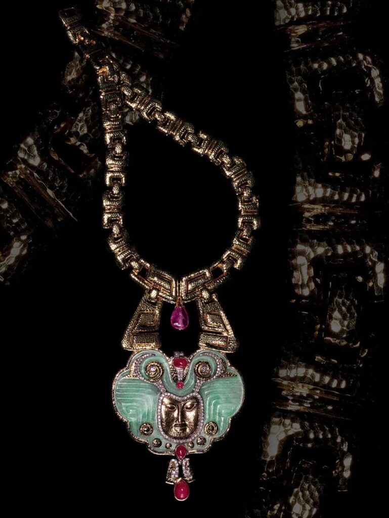 David Webb "Dreamer" necklace made of hammered 18K gold and carved jade, rubies