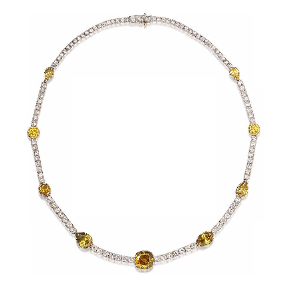 Chameleon diamond necklace featuring eight fancy colored diamonds, including chameleon diamonds