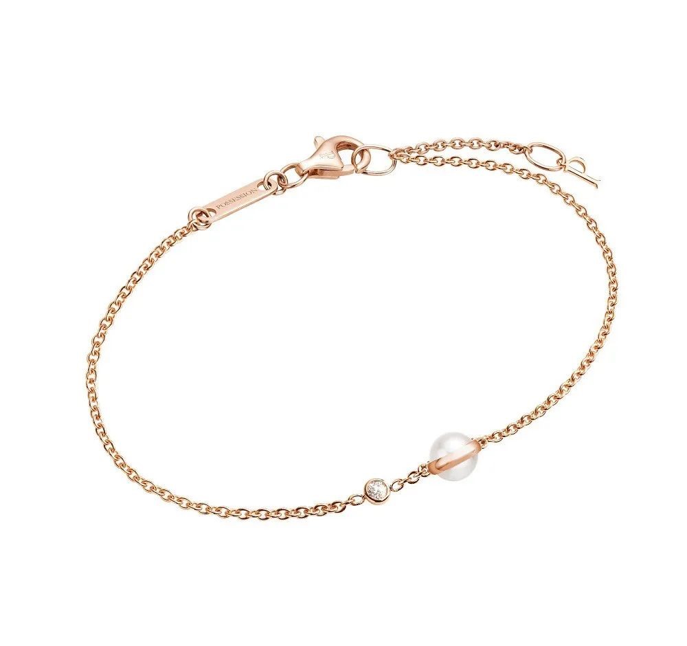 Possession Rose Gold Bracelet, by Piaget
Set with one mother-of-pearl bead, accented with one round-cut diamond of 0.04ct.