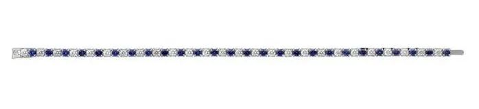 Cartier 
Essential Lines tennis bracelet
Diamond and sapphire