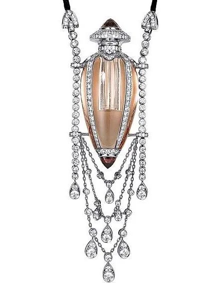 Cartier perfume pendant
Platinum, morganite, spinel, diamonds