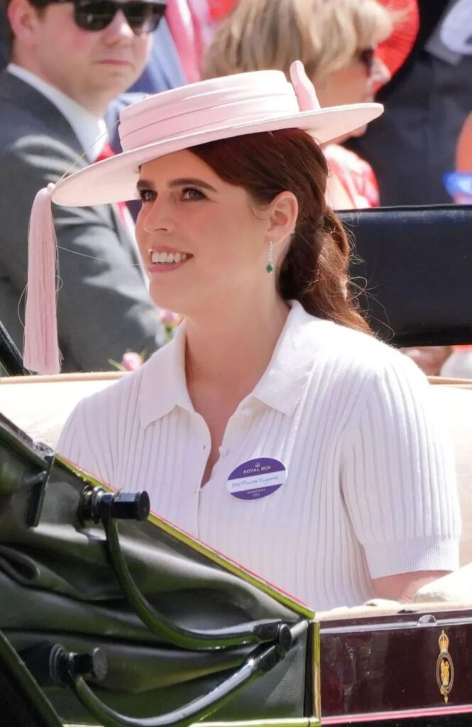 
Princess Eugenie wearing her diamond and emerald wedding earrings.