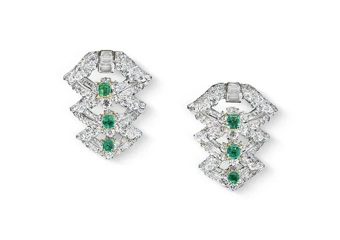 Diamond and emerald double-clip brooches circa 1930 by Cartier from Palais Royal.