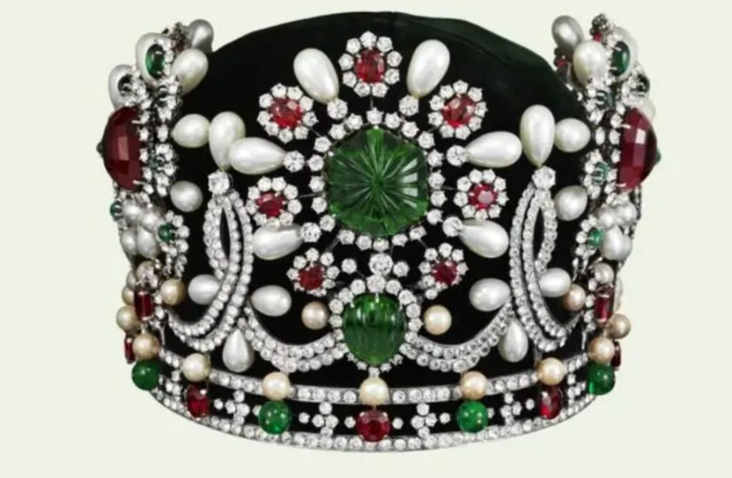 The Iranian Empress's coronation crown, featuring a 150-carat emerald as the main stone