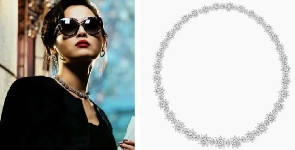 Li Li wearing a Harry Winston diamond necklace in "Blossoms Shanghai"