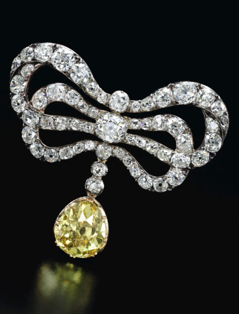 Bow ribbon diamond brooch