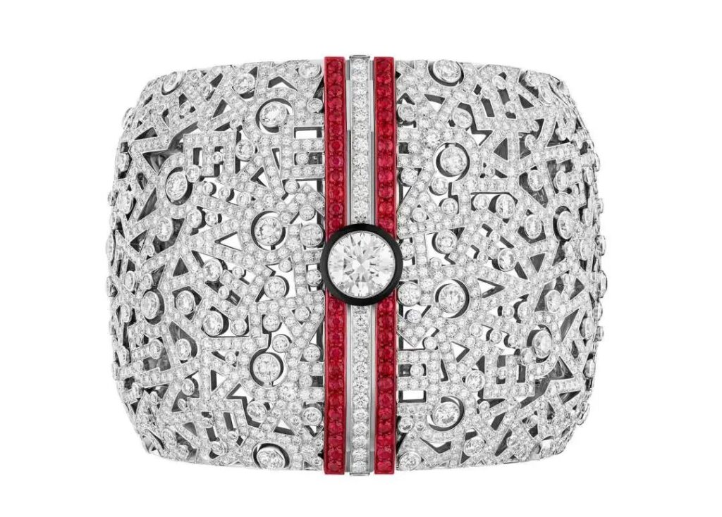 Chanel
Sport High Jewelry Collection
Print Cuff Bracelet
White gold, diamonds, rubies, carbon, black lacquer, red aluminum