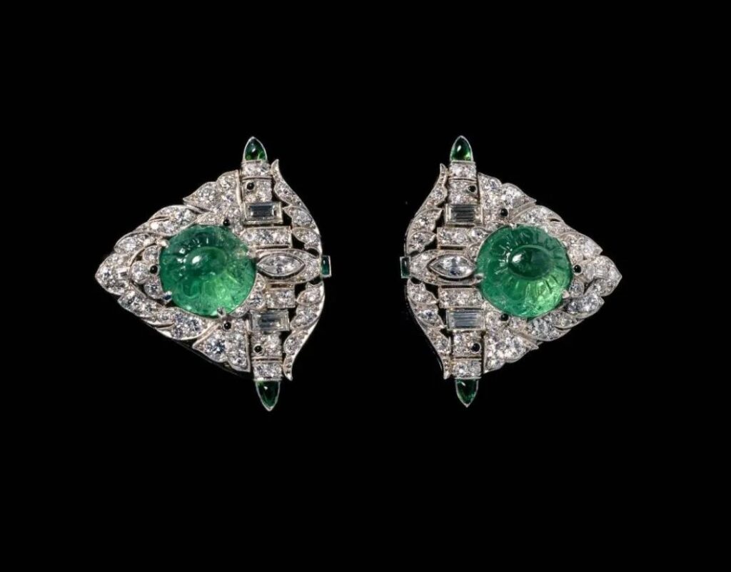 Marcus & Co 'Jabot Pin' style brooch, circa 1920, platinum, diamonds, chalcedony, emerald, from the Faerber Collection