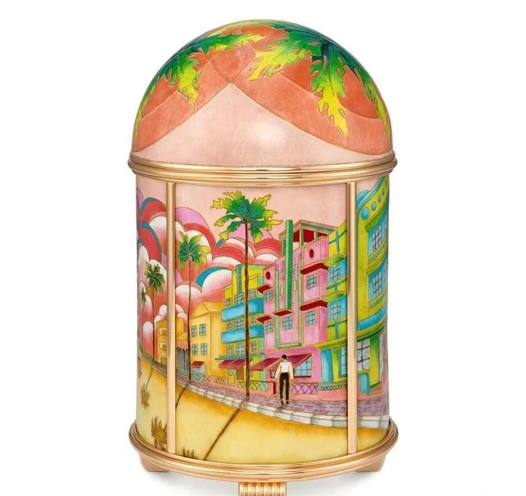 The vibrant colors of Miami Beach's Art Deco-style architecture are perfectly recreated in this dome clock, with lush palm trees coming to life in 39 enamel colors.