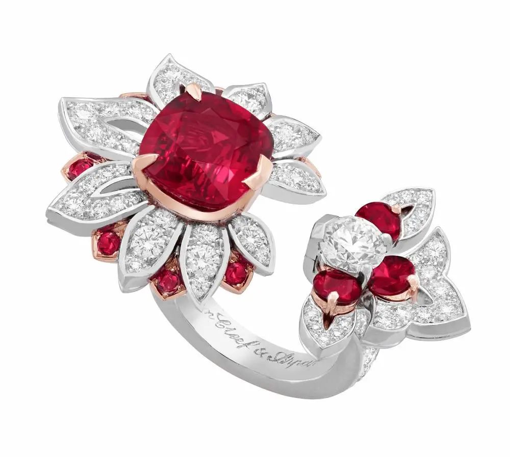 Kolam white gold between-the-finger ring, by Van Cleef & Arpels
Main stone is a 5.38ct cushion-cut ruby, accented with rubies and diamonds