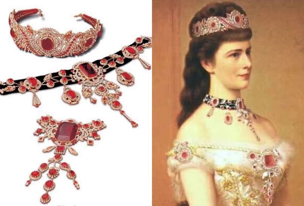 Princess Sissi's ruby jewelry set, crafted from Marie Antoinette's rubies, features a stunning large Stomacher brooch in addition to the tiara.