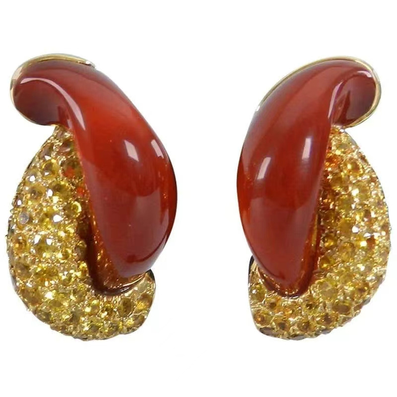 Coral and gold earrings, by Seaman Schepps