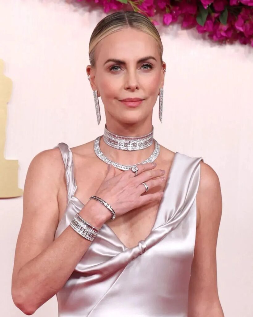 Charlize Theron wearing Boucheron jewelry