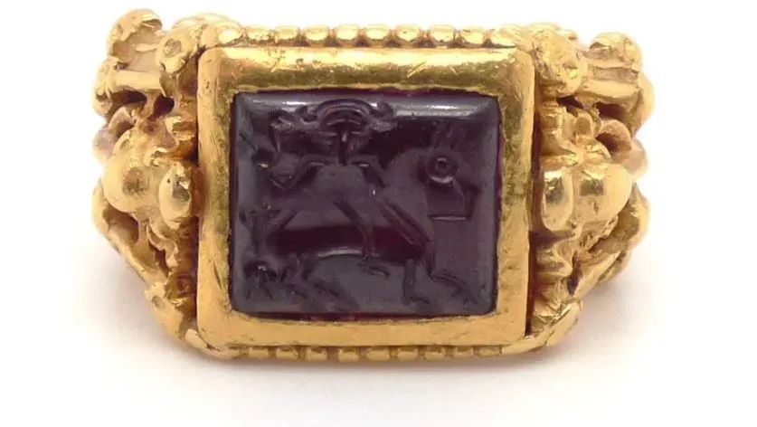 Wiese carved garnet coat of arms ring
Circa 1867