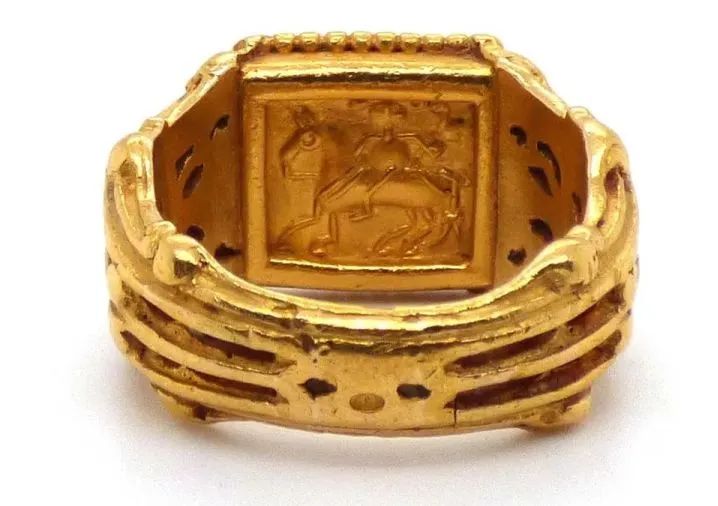 Wiese carved garnet coat of arms ring
Circa 1867