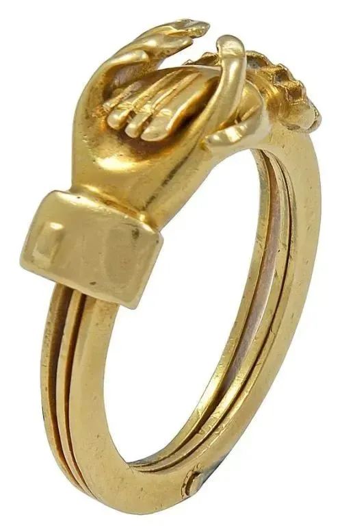 A ring symbolizing lifelong commitment, with a woman's hand placed on a man's hand
Circa 1840