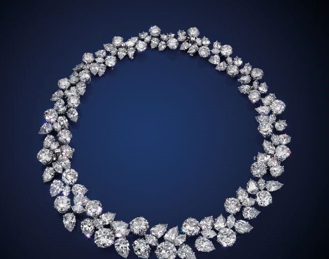 Diamond Wreath Necklace
HARRY WINSTON, 1961
Three largest diamonds weighing approximately 5.31, 4.92, and 3.91 carats
Can be separated into two bracelets
Estimate: USD 1,500,000 - USD 2,500,000
Sold for: USD 1,812,500
December 2017, New York