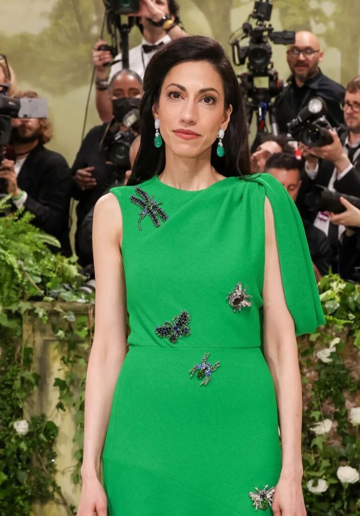 Huma Abedin wearing emerald earrings