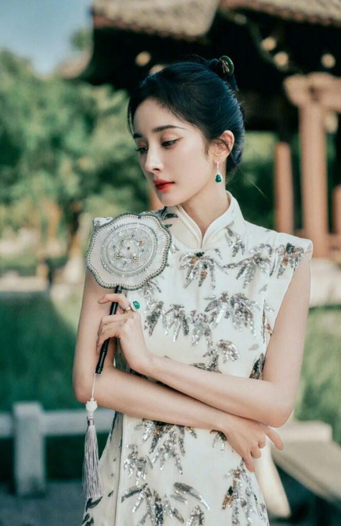 Yang Mi wearing jadeite earrings and ring