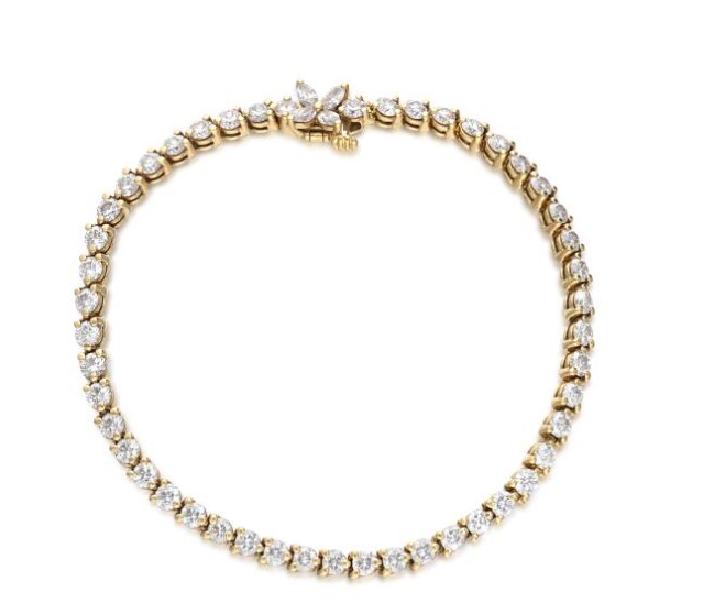 TIFFANY & CO. yellow gold and 5.20-carat diamond Victoria tennis bracelet, $15,335.