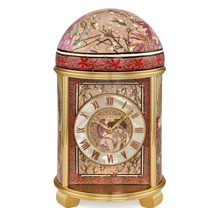 The White Water Lilies dome clock, inspired by Monet's summer garden paintings, recreates the ripples on the water's surface and the light on the water using extensive cloisonné enamel.