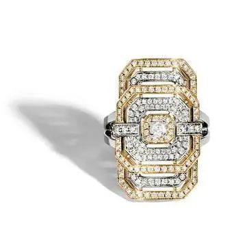 The "My Way" ring by Statement Paris features white gold, yellow gold, and diamonds