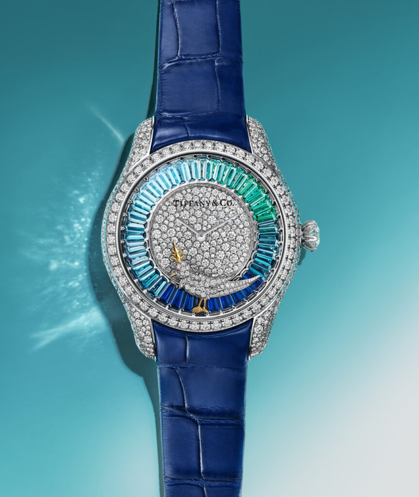 Jean Schlumberger by Tiffany "Bird on a Rock" 39mm watch; 18K white gold set with diamonds, sapphires, blue topaz, and emeralds